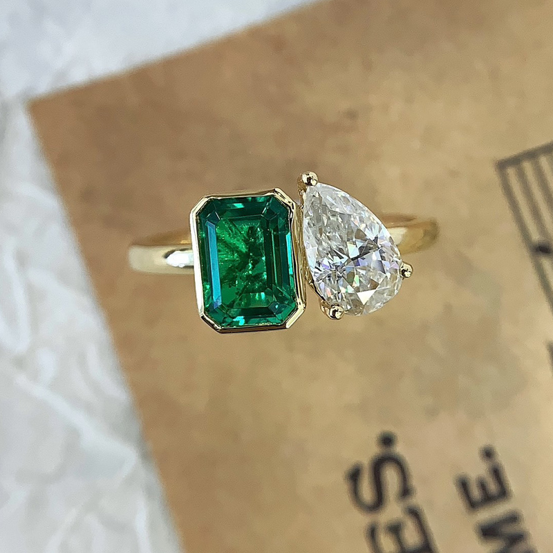 1.7ct Emerald and moissanite wedding ring